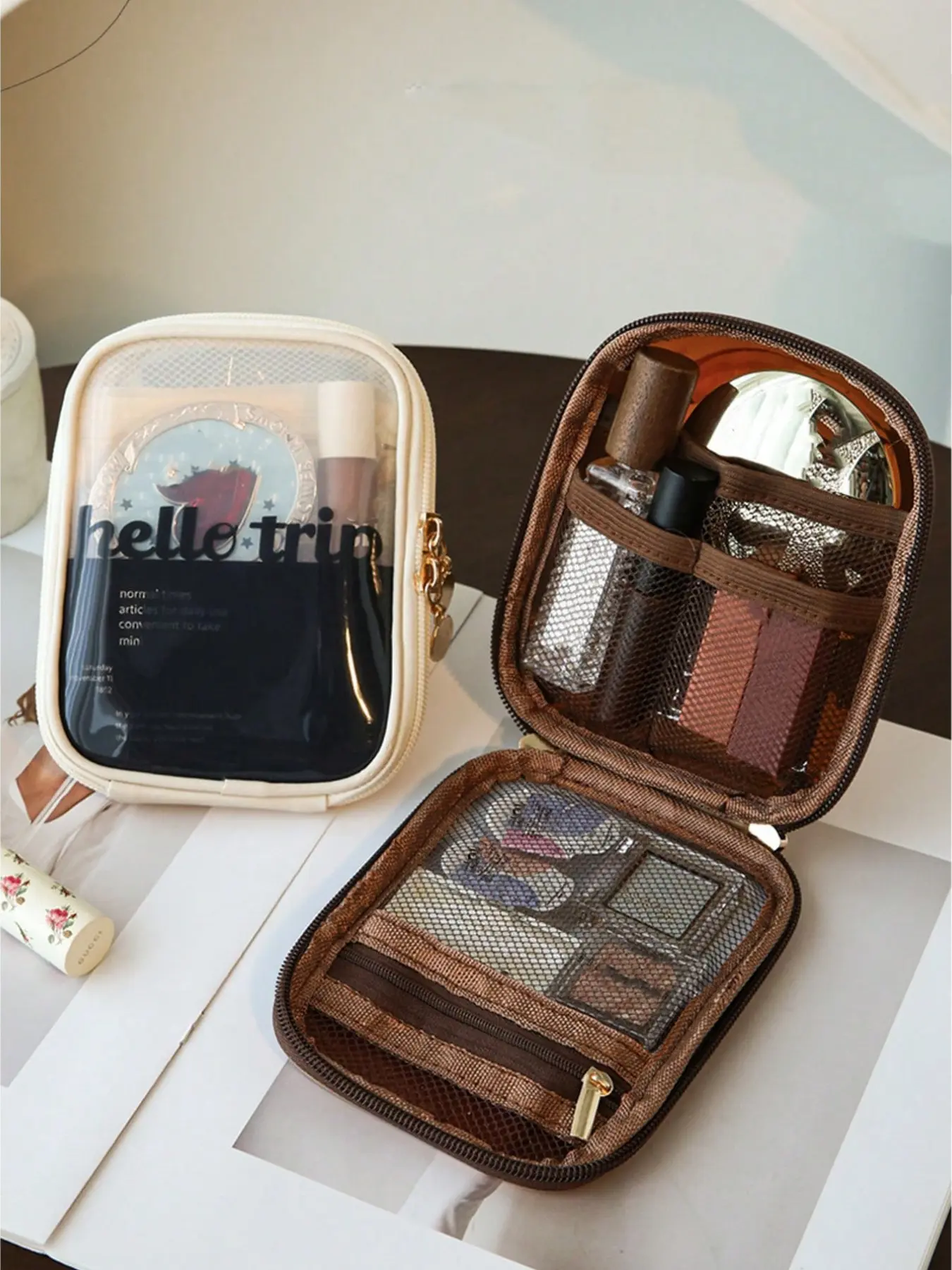 This transparent zippered travel makeup bag is compact and portable, perfect for traveling, keeps skincare and makeup products organized, has large capacity and a mini touch-up pouch, Makeup Storage Bag, Cosmetics Bag
