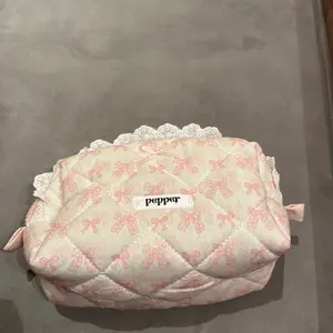 Coquette portable cosmetic bag