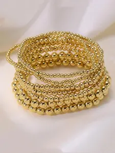 A 7-piece set of gold elastic bracelets, with a retro style suitable for daily wear, vacation dates, and other occasions. It is also a surprising and exquisite small gift