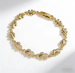 Elegant gold-plated elephant link bracelet with sparkling crystals, perfect for everyday wear. Nickel-free and safe, featuring a secure fold-over clasp to elevate your daily style.