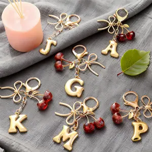 Women's Keychain Accessory Cherry Bow Letter Pendant for Casual Style Use on Backpack, Wallet, Handbag, Car Keys Great for Students