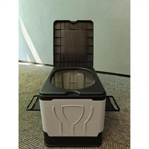 Foldable camping toilet with lid, made of shock-resistant and shatter-proof PP material, featuring a sophisticated gray and black design, compatible with various vehicle models, equipped with  waste container and tissue holder.