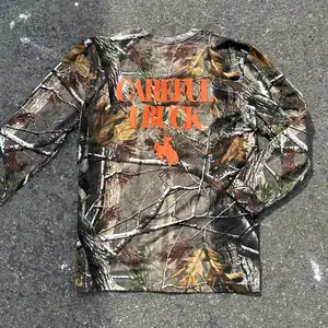 Long-sleeve “Careful I Buck” Tee