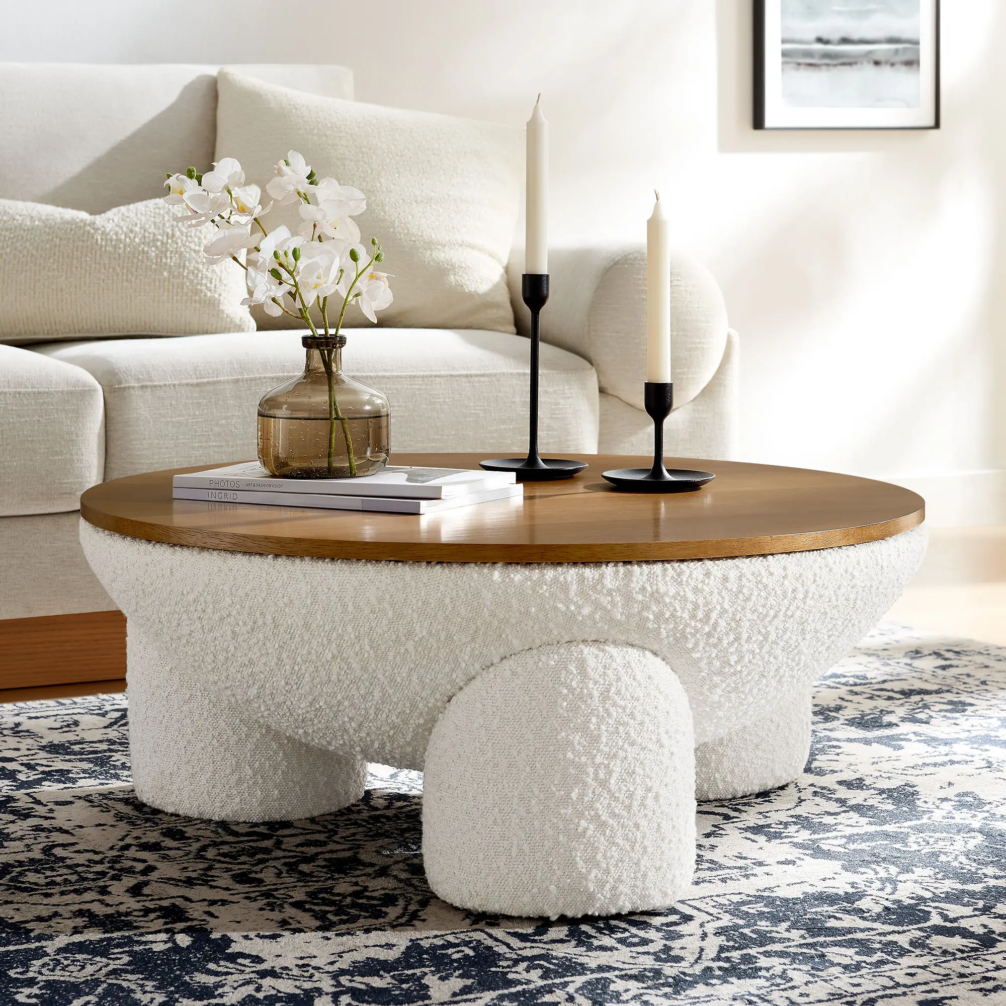 Tridome Round Boucle Upholstered Storage Coffee Table in Natural Ivory Tridome Round Boucle Upholstered Storage Coffee Table in Natural Ivory