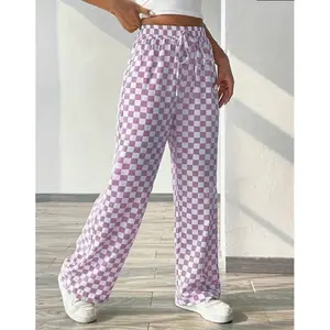 Women’s straight-leg pants with an all-over checkerboard print and a drawstring waist; casual, comfortable high-waisted trousers for everyday wear; ladies’ bottoms suitable for all seasons; bridal black and white.