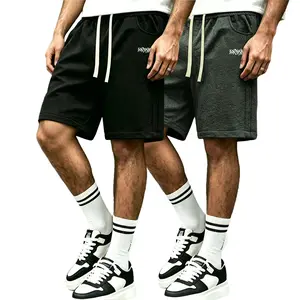 Pack of 2 men’s black athletic shorts with letter print, drawstring waist, elastic waistband, side pockets; soft, breathable summer streetwear shorts; versatile men’s sports bottoms suitable for everyday workouts.