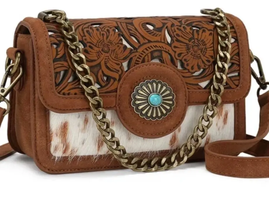 TRINITY RANCH COWHIDE FLORAL CUTOUT CROSSBODY BAG