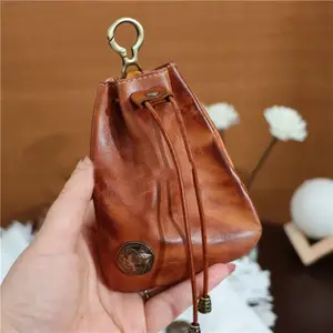 Stop digging through your bag for small items. This genuine leather mini wallet holds coins cards and even AirPods. Maximum organization in a tiny size. Ideal for travel.