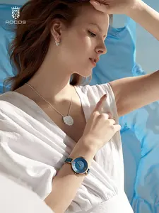 ROCOSJEWE Women's R0309 Ceramic Quartz Analog Watch Blue Dial Rose Gold Accent 34mm Ultra-Thin 3ATM Waterproof Butterfly Clasp Elegant Design