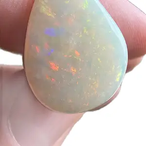 Australian Opal 8.05 Carats - Colorful Gemstone Displayed in Hand for Visual Appeal