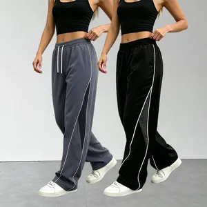 2-pack polyester women’s athletic wide-leg pants for spring/summer—lightweight, loose fit with side stripes, color-block design, elastic waistband with drawstring, casual street style long pants