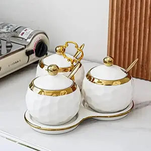 Set of 3 Elegant White & Golden Ceramic Porcelain Condiment Pots with Trays, Lids & Spoons - Durable Crack-Resistant Spice Jars, Salt & Sugar Canisters with Golden Knob Lids & Matching Trays for Kitchen, Dining Table