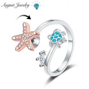 Rotatable anxiety-relieving ring with natural starfish and turtle elements, adjustable opening design, unisex ring.