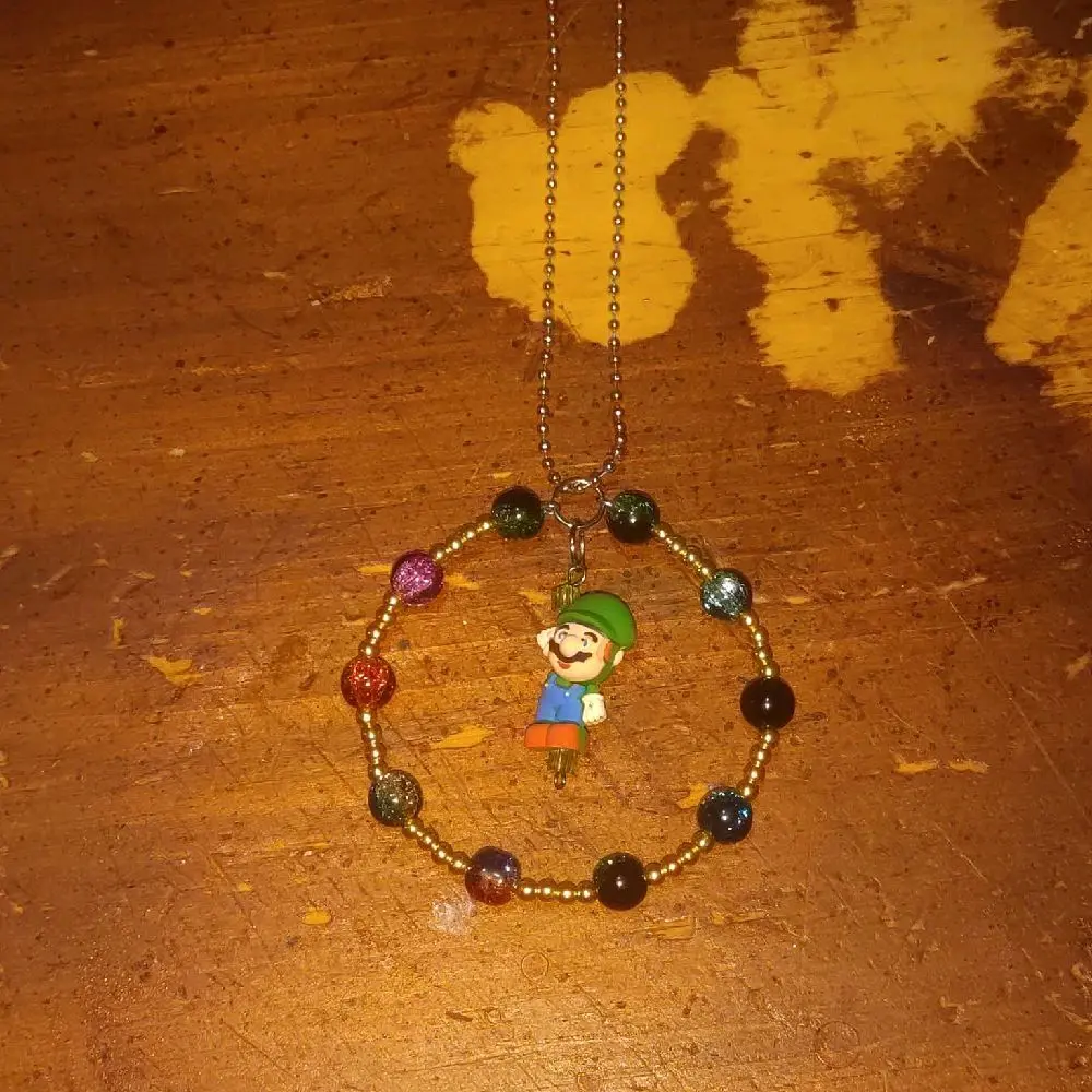 Green character  mirror hanger