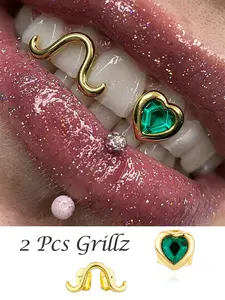 2 Pcs 14K Gold Plated Copper Grillz Set, Love Heart Green CZ & S-Shape Bling!Unisex Design for Black Women, Girls & Men – Perfect for Parties, Halloween, Cosplay or Gifts! Fashion Hip-Hop Style Teeth Jewelry with Statement Love Heart & S-Shape CZ Accents.