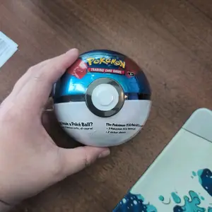 pokemon tin with 3 packs and stickers