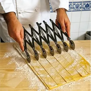 1 retractable multi wheel slicing roller knife, with a seven wheel adjustable telescopic structure, capable of uniformly cutting multiple dough, noodles, and pizza strips at once. It is a household and commercial baking tool for pastry making