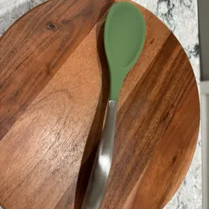 Espátula ranurada en color azul. Princess House