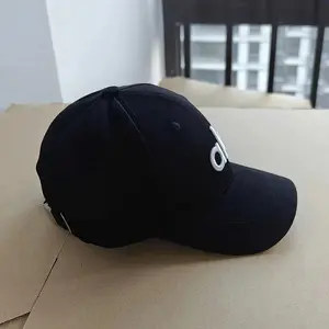 Performance District Trucker Hat, Off-Duty Cap, Black Baseball with White Letter "O" Design - 100% Polyester, Sun Protection & Fit for Outdoor Running and Activities, Outdoor Headwear Minimalist Baseball Durable Woven cap