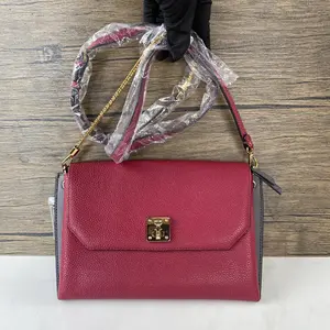 Pre-owned MCM leather Crossbody Bags red pebbled chain crossbody bag+Bag charm+++