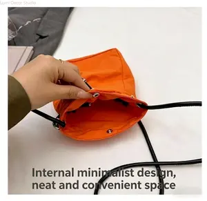 Trendy Mini Drawstring Crossbody Bag - Lightweight Water-Resistant Nylon Small Phone Purse for Women, Cute Casual Everyday Carry Bag with Adjustable Strap & Secure Snap Closure