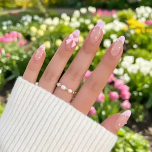 24pcs of Cute Short Press On Nails with Pink French And Pointed Design with 3D Bow And Pearl Additions