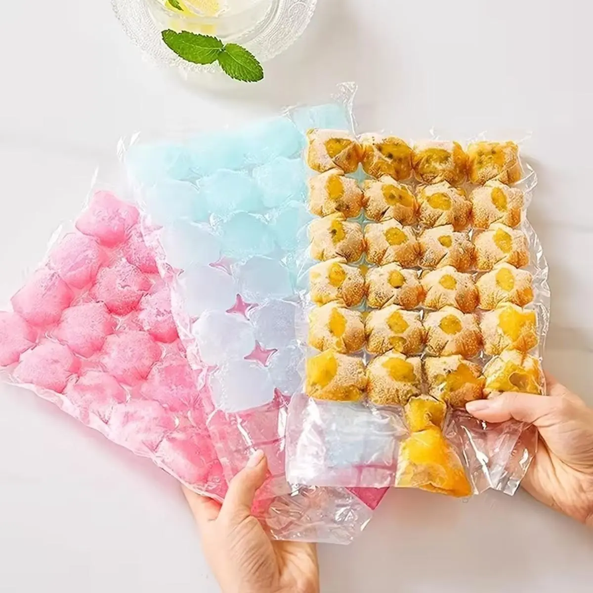 Disposable ice pack with funnel -50 self sealing freezing molds, stackable storage, suitable for food and beverage refrigeration (household goods storage and organization)
