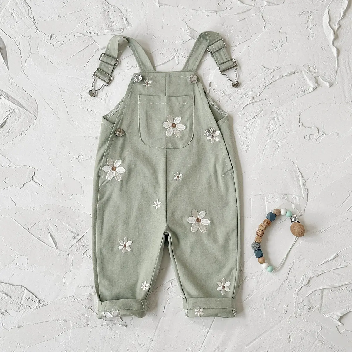 Spring/Summer/Autumn baby green soft, comfortable, loose-fit romper with delicate floral embroidery (one romper, no shoes, hats, or other accessories included).