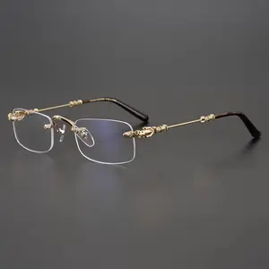 A pair of retro square frameless glasses, with gold and silver zinc alloy frames and high-definition transparent lenses, featuring a stylish business design, mature and elegant appearance, ideal for gifting and everyday wear