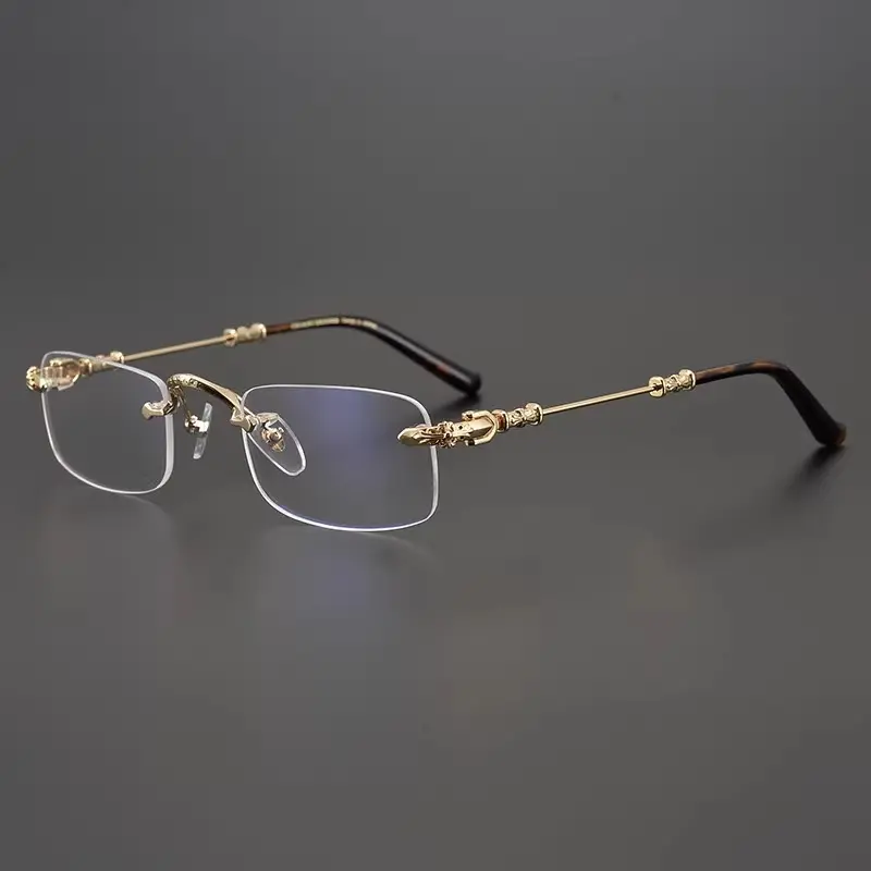 A pair of retro square frameless glasses, with gold and silver zinc alloy frames and high-definition transparent lenses, featuring a stylish business design, mature and elegant appearance, ideal for gifting and everyday wear