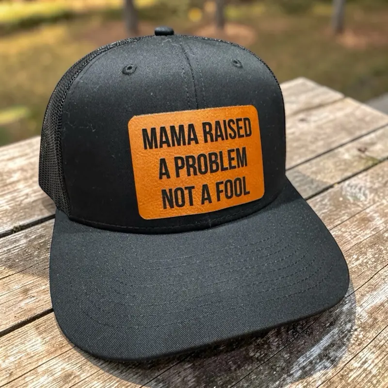 “Mama raised a problem not a fool” black mesh trucker hat
