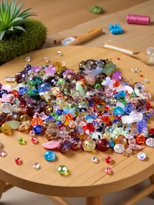 A box of 105g mixed Premium Glass Beads of different styles, used for jewelry making, DIY lighting, arts and crafts, and decorative arts enthusiasts. Color crystal combinations are mixed in bulk