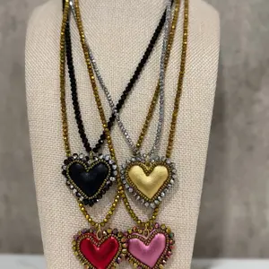 Beautiful long handmade heart necklaces.
