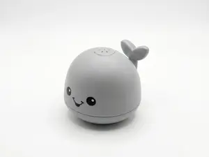 Automatic water-spraying whale with LED lights - waterproof, fun bath and pool essential, battery powered (batteries not included).