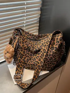 Leisure and fashionable retro atmosphere leopard print shoulder bag, adjustable shoulder strap, large capacity design, decorated with plush teddy bear pendant, suitable for daily commuting, shopping, and socializing, Fashionable Patterned Bag