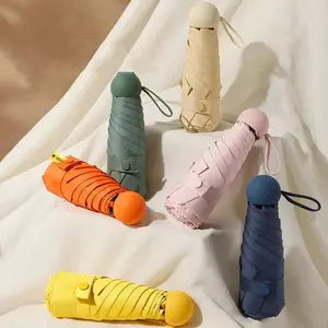 Capsule sun umbrella, dual purpose sun and UV protection umbrella, windproof, sun and rain, mini five-fold ultra-light portable, convenient to outdoors in the summer.