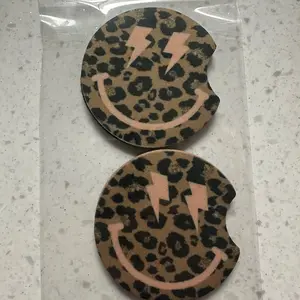 Cheetah print lightning car coasters
