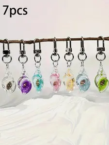 7pcs Glow-In-The-Dark Transparent Shell Resin Pendants, Ocean Style Charm Keychain Phone Strap, Fashion Accessory for Women & Girls