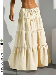 Long layered, Tiered skirt, Casual Flowing pleated fabric, multi-layered ruffles, creating a swaying effect, Elastic waist with drawstring, comfortable fit, Available in black/white, perfect for summer outfits, brunch, or vacation vibes