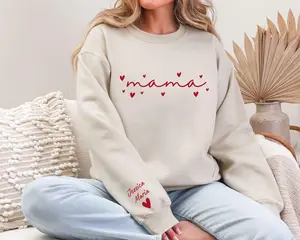 Custom This Mama Wears Her Heart On Her Sleeve Sweater, Personalized Mom With Kids Names T-shirt, Motherhood Gift, Mother's Day Gifts