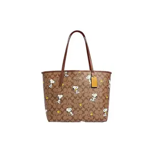 COACH x Peanuts Snoopy Dempsey 33 Tote Bag with Classic Monogram and Buckle Closure in Brown for Women