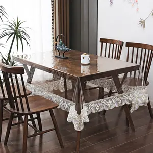 1pc elegant transparent PVC tablecloth with lace trim design—waterproof and oil-resistant dining table protector, easy to clean, suitable for home use and various party activities. Luxurious floral lace-edged table cover.