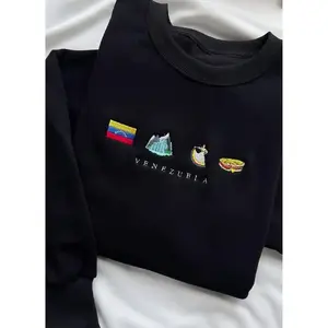 Venezuela Embroidered Sweatshirt   Unisex Black Crewneck with Angel Falls  Arepa  Guacamaya   Caracas Symbols  Latin Heritage Gift