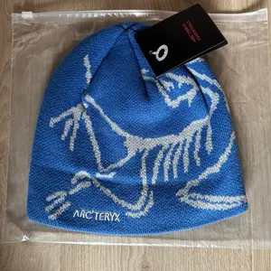 Arc’Teryx Beanie in Blue with White Design and Logo, Soft Fabric, Ideal for Cold Weather