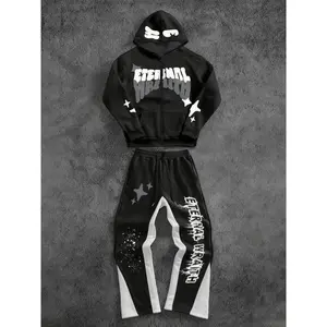 Y2K streetwear set featuring a printed hoodie and star-print pants, made from comfortable wool for casual wear; TikTok men’s and women’s fashion trend GARMENTARY