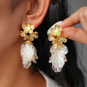 A pair of stylish and cute zircon acrylic petal fringed women's earrings