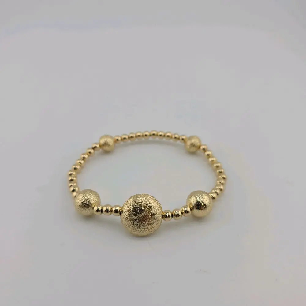 Pulsera Elástica de Oro Laminado 14K con Esferas Texturizadas