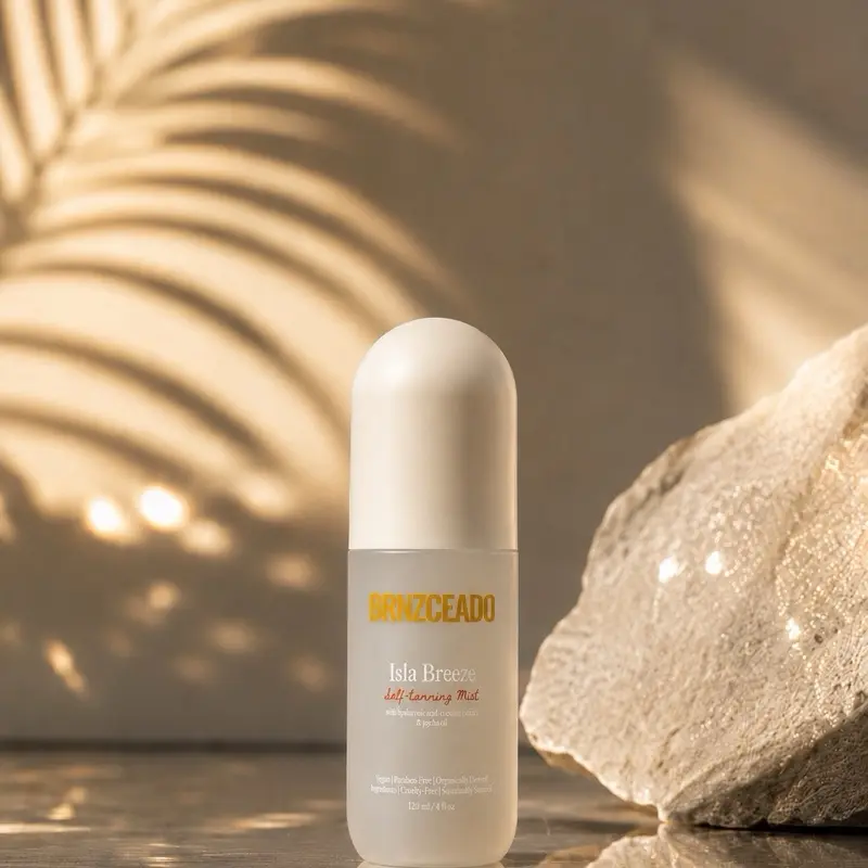 Isla Breeze | Self Tanning Mist with Hyaluronic Acid. It is clear, lightweight, and hydrating. Body Care.