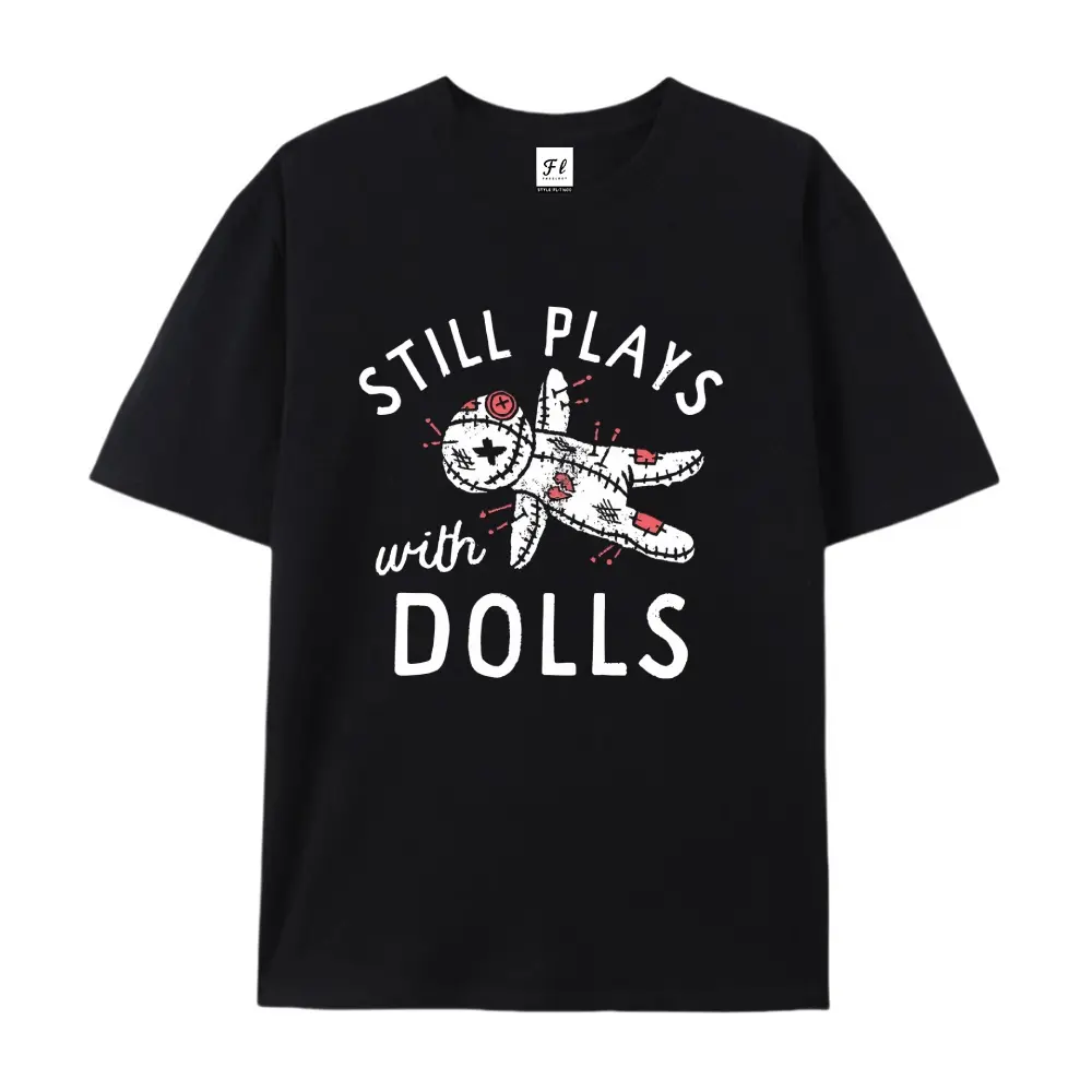 "Still Plays With Dolls" Voodoo Doll Cotton T-Shirt, Spooky Humor Graphic Tee, Comfort Casual Outfit, Perfect Gift For Gothic Fans & Dark Humor Lovers, Ideal Everyday Outfit