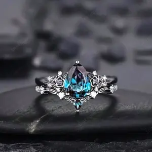 Gothic black gold 2-piece engagement ring set, pear-shaped Alexander stone design, combined with black flower ring and unique platinum magic ring